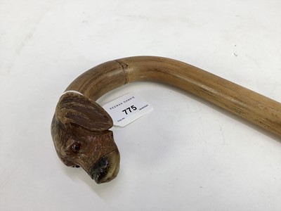 Lot 775 - Walking stick with carved hound’s head knop, pair of glass eyes and horn snout, 90.5cm long