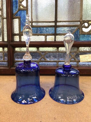 Lot 432 - Two ‘Bristol’ blue glass bells, one with hollow blown clear glass handle