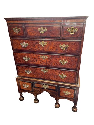Lot 1517 - 18th century and later figured walnut and crossbanded chest on stand