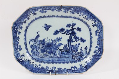 Lot 353 - 18th century Chinese blue and white porcelain platter, decorated with two birds in a fenced garden, 34cm wide