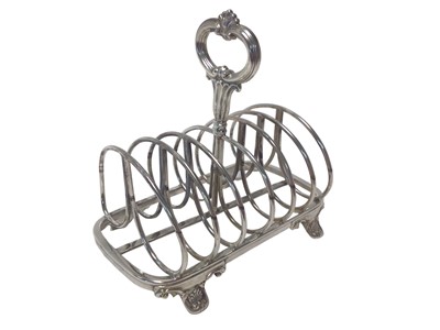 Lot 556 - William IV silver toast rack by Waterhouse, Hudson & Co. Sheffield 1832