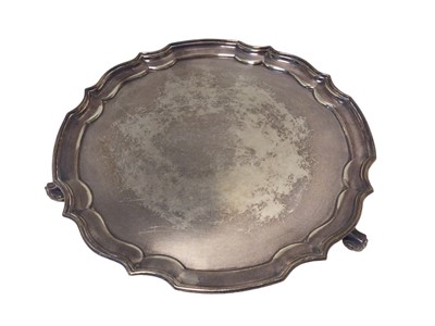 Lot 32 - Silver salver, with pie crust rim and three scroll feet, Birmingham 1971, 25.5cm wide, 18.1oz