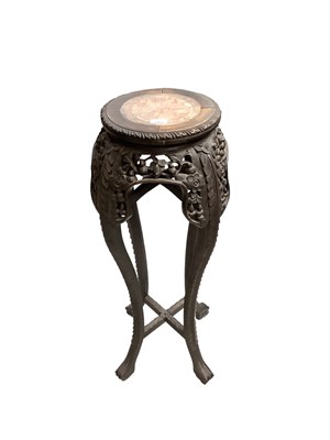 Lot 1161 - Late 19th century Chinese carved hardwood jardinière stand with inset marble top, the underside marked with Chinese characters.