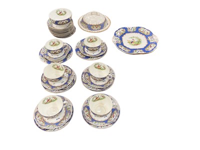 Lot 36 - 1920's bone china teaset, decorated with Worcester style decoration retailed by Maple & Co.