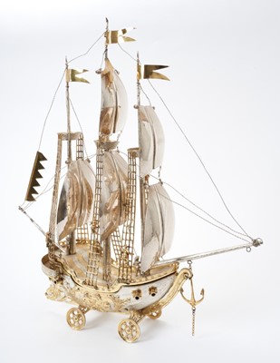 Lot 191 - Contemporary continental parcel gilt model of a galleon on wheels, London import marks