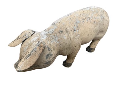 Lot 150 - A painted wood butcher's shop pig