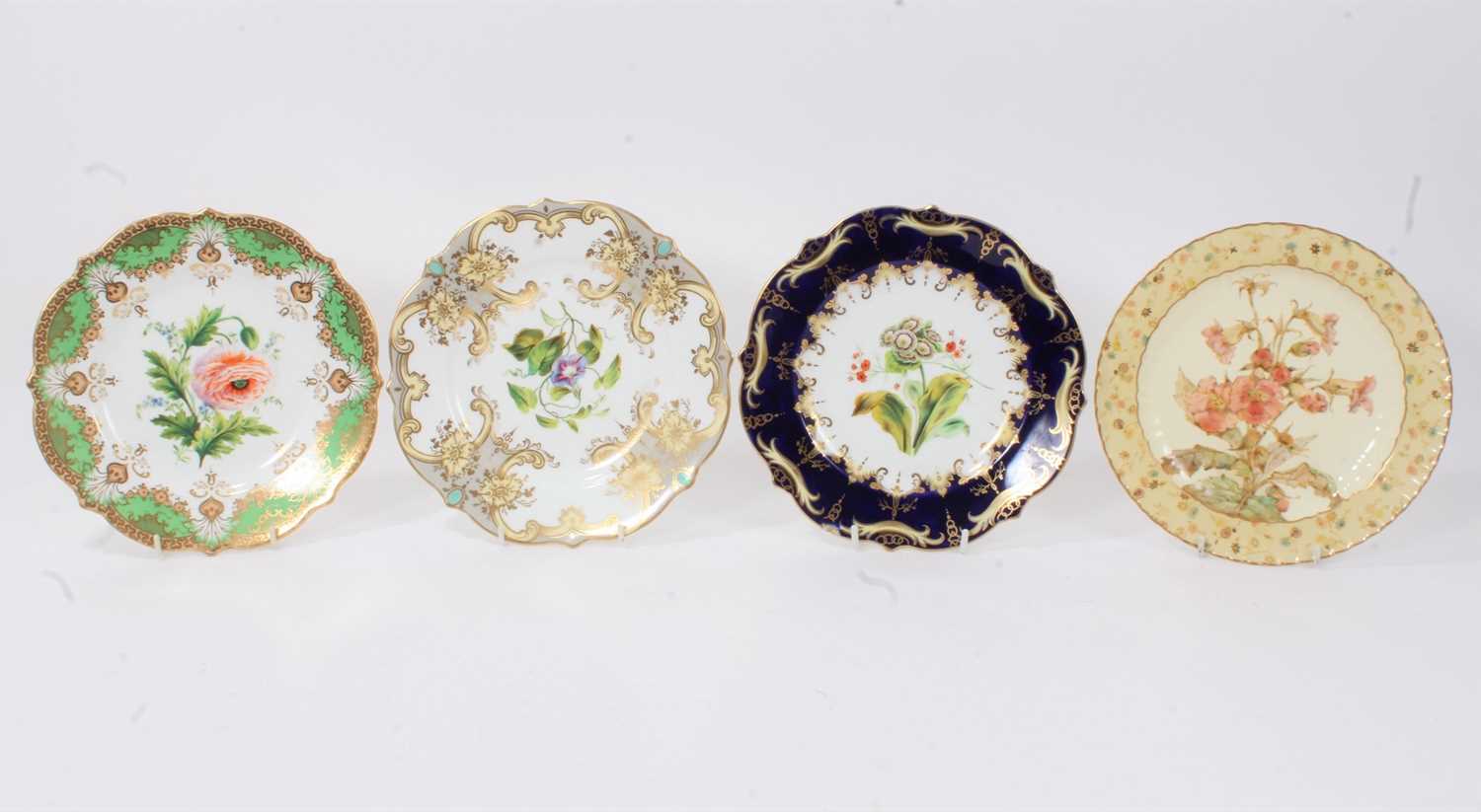 Lot 28 - Three good quality Regency porcelain plates decorated with botanical specimens