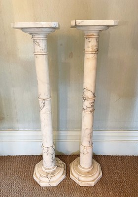 Lot 1057 - Pair of Victorian marble columns, with canted square platform and octagonal stepped bases, 97cm high