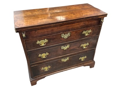 Lot 1063 - George I walnut bachelor's chest, with rectangular fold over top and three graduated drawers on bracket feet, 88cm wide x 37cm deep x 80cm high