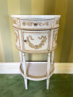 Lot 1075 - Antique French painted and gilt marble topped demi-lune side table, with frieze drawer and cupboard below on turned fluted supports united by a dished undertier, 49cm wide x 33cm deep x 83cm high