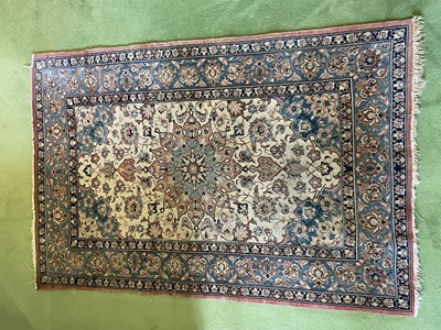 Lot 1079 - Kashan style rug, with central foliate medallion on cream field in main lotus flower border, 156 x 104cm
