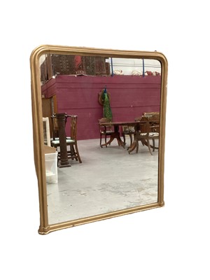 Lot 1140 - A Victorian gilt overmantel mirror of arched form, 135cm high x 108cm wide