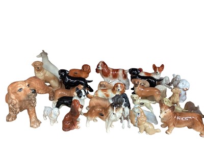 Lot 617 - Collection of dog ornaments, various manufacturers including Wade and Coopercraft - 1 shelf