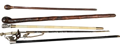 Lot 227 - Silver mounted cane and other canes