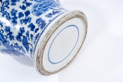 Lot 30 - 18th century Chinese blue and white baluster vase and cover, with phoenix ornament.