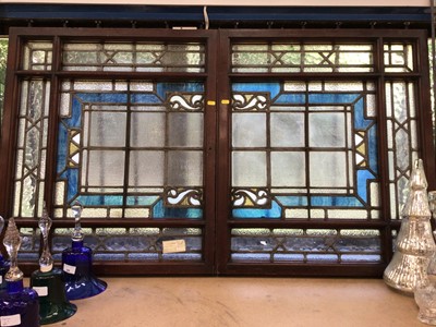 Lot 71 - Pair of Edwardian stained glass panels in mahogany frames together with a pair of leaded glass panels (4)