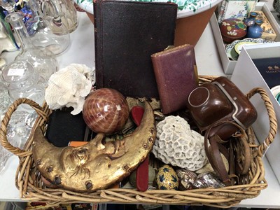 Lot 326 - Basket containg various items including hard stone polished eggs, crescent moon wall plaque, vintage Zeiss camera, ornaments, two wristwatches, two leather bound diaries etc