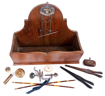 Lot 1341 - Pine candle box housing a collection of collectables, including Regency cotton reel holder with silver and inset momenti mori, dated 1805, other sewing related accessories and sundries