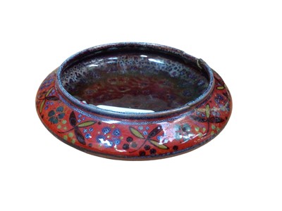 Lot 95 - A Royal Doulton flambe 'Sung' bowl, decorated with a floral pattern around the shoulder, marks to base, 12cm diameter