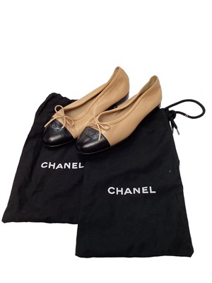 Lot 2082 - Chanel shoes in dark cream leather with CC logo on black patent toe cap with soft dust bags.  Size 36.  Unworn