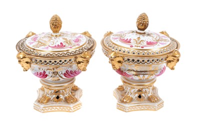 Lot 5 - Pair of early 19th century Derby pot pourri, of urn form, the rims pierced, with applied masks and paw feet on shaped bases, painted in pink enamel and gilt with foliate patterns, marked to bases,...