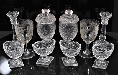 Lot 9 - Group of 19th century cut glass, including a set of four salts, a pair of sweetmeats and covers, a pair of candlesticks and a pair of wine glasses with etched ferns and stags (10)