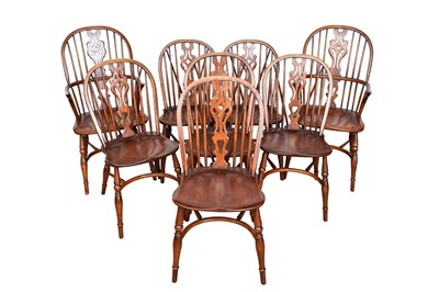 Lot 1083 - Set of eight 19th century style ash and elm stick back windsor chairs, each with pierced splat and saddle seat on turned supports with crinoline stretcher, to include a pair of carvers