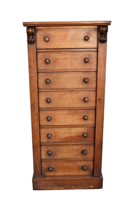 Lot 1106 - Early Victorian walnut Wellington chest, with bank of eight graduated drawers between locking stiles on plinth base, 62cm wide x 43cm deep x 138cm high