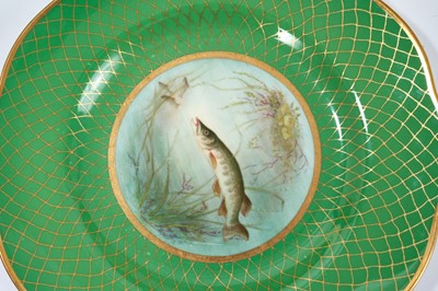 Lot 18 - Set of twelve early 20th century Spode plates decorated with fish, titled verso, on a green and gilt fish-scale ground, stamped marks, 23cm diameter