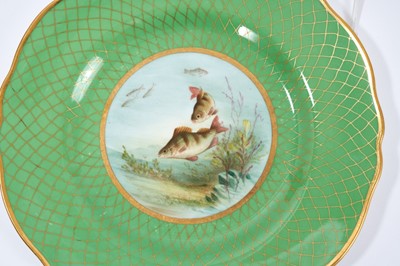 Lot 18 - Set of twelve early 20th century Spode plates decorated with fish, titled verso, on a green and gilt fish-scale ground, stamped marks, 23cm diameter