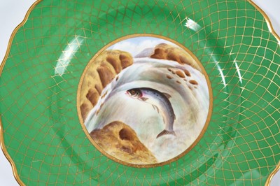 Lot 18 - Set of twelve early 20th century Spode plates decorated with fish, titled verso, on a green and gilt fish-scale ground, stamped marks, 23cm diameter