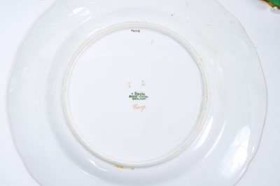 Lot 18 - Set of twelve early 20th century Spode plates decorated with fish, titled verso, on a green and gilt fish-scale ground, stamped marks, 23cm diameter