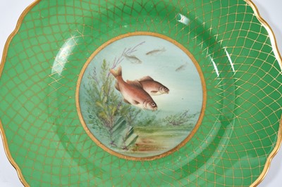 Lot 18 - Set of twelve early 20th century Spode plates decorated with fish, titled verso, on a green and gilt fish-scale ground, stamped marks, 23cm diameter