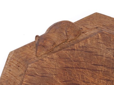 Lot 1401 - Robert 'Mouseman' Thompson carved oak breadboard, of canted form, 31cm wide