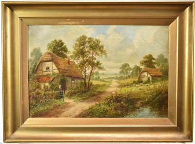 Lot 939 - David Bates, late 19th century, oil on canvas - Rural Landscape with Thatched Cottages, signed, 30cm x 45cm, in gilt frame