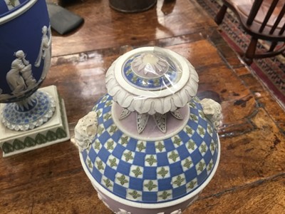 Lot 92 - Rare garniture of three 19th century Wedgwood jasper ware vases