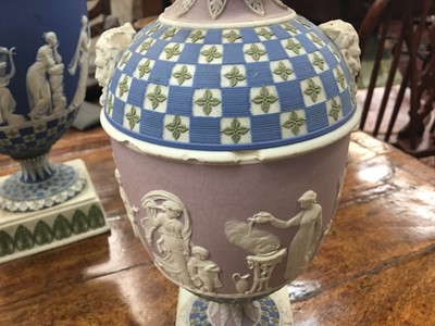 Lot 92 - Rare garniture of three 19th century Wedgwood jasper ware vases