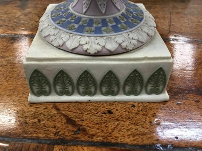 Lot 92 - Rare garniture of three 19th century Wedgwood jasper ware vases