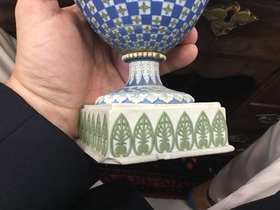 Lot 92 - Rare garniture of three 19th century Wedgwood jasper ware vases