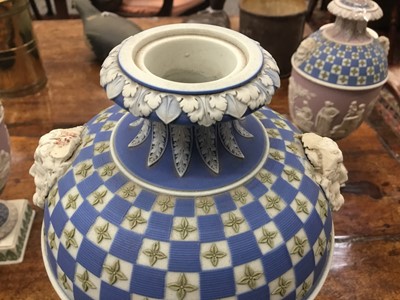 Lot 92 - Rare garniture of three 19th century Wedgwood jasper ware vases