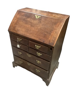 Lot 1152 - Early 18th century oak bureau of small proportions