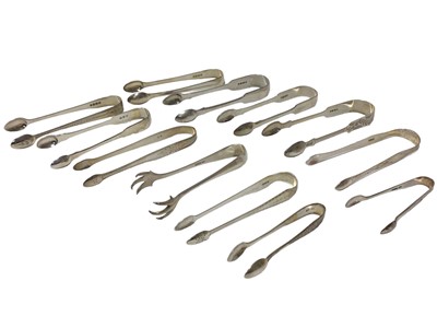 Lot 230 - Good collection of twelve pairs of silver sugar tongs, mostly Georgian and Victorian