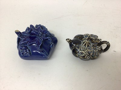 Lot 21 - Two Oriental glazed water droppers