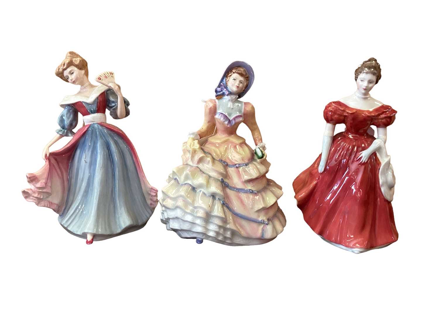Lot 1242 - Ten Royal Doulton figures - Hannah HN3369, Loretta HN2337, Gail HN4804, England HN3627, Harmony HN4610, Regal Lady HN2709, Winsome HN2220, Masquerade HN2251, Amy HN3316 and May HN2711