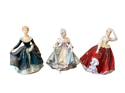 Lot 1246 - Ten Royal Doulton figures - Reverie HN2306, The Skater HN2117, Joanne HN3422, Victoria HN2471, Diana HN3266, Gail HN2937, Janine HN2461, Sweet April HN2215, Gillian HN3742 and Southern Belle HN2425