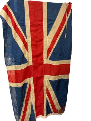 Lot 818 - Old canvas Union Jack together with an ensign flag (2)