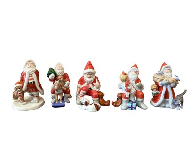 Lot 1283 - Twelve Royal Copenhagen limited edition The Annual Santa figures 2001-2012 (2006 missing)