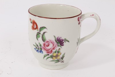 Lot 67 - An unusual Worcester coffee cup, with entwined handle, painted with flowers, circa 1770