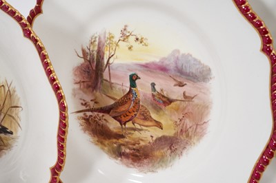 Lot 276 - A set of twelve Royal Worcester plates, printed and painted with game birds, retailers marks for James Green and Nephew, London, marks for circa 1903