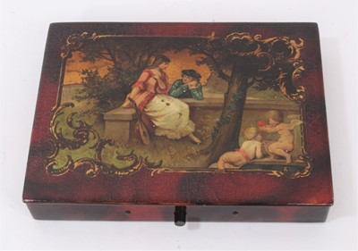 Lot 680 - 19th Century Continental lacquered papier mache box, the hinged lid decorated with a courting scene in a rococo border, the interior with sectioned compartments.